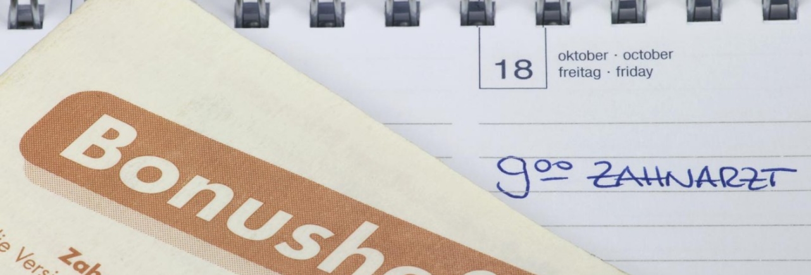 Bonusheft und Zahnarzttermin